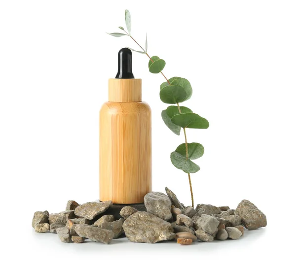 Wooden Bottle Cosmetic Oil Eucalyptus Branch Stones White Background — Stock Photo, Image