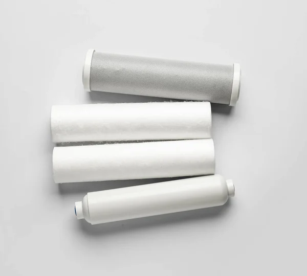 New Water Filter Cartridges Grey Background — Stock Photo, Image