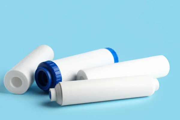 New Water Filter Cartridges Blue Background — Stock Photo, Image
