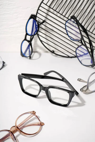 Different Modern Eyeglasses Stand White Table Wall — Stock Photo, Image
