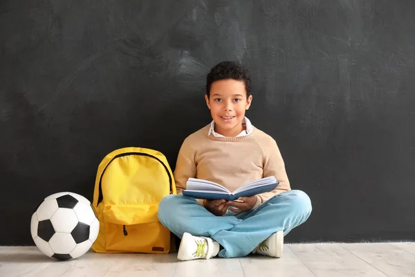 Little African American Boy Reading Book Blackboard Children Day Celebration — Stock Photo, Image