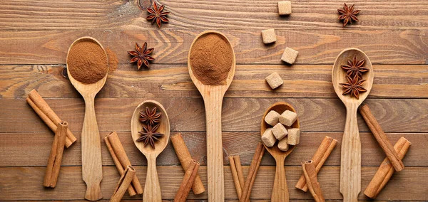 Spoons Cinnamon Anise Sugar Wooden Background Top View — Stock Photo, Image