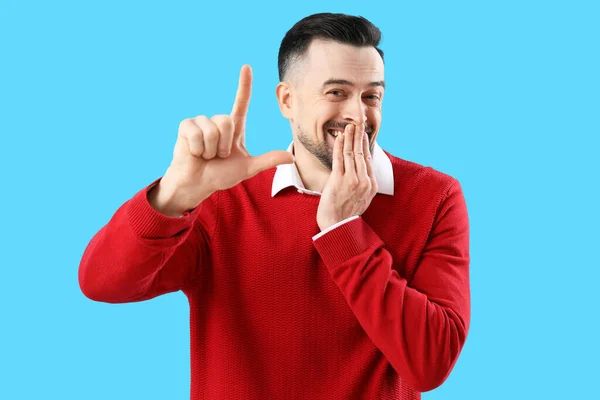 Handsome Man Showing Loser Gesture Blue Background — Stock Photo, Image