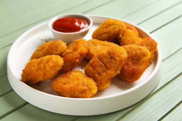 Plate Delicious Nuggets Bowl Ketchup Green Wooden Table — Stock Photo, Image