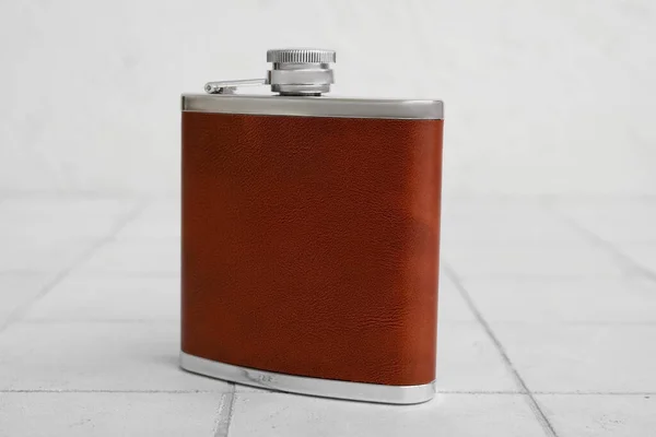 New Hip Flask White Tile Table — Stock Photo, Image