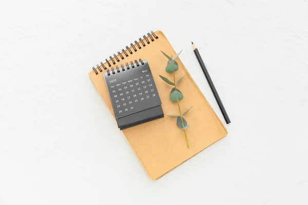 Flip Paper Calendar Notebook Eucalyptus Branch Light Background — Stock Photo, Image
