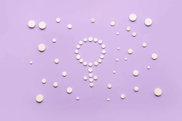 Symbol Woman Made Hormonal Pills Lilac Background — Stock Photo, Image