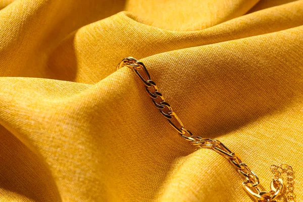 Beautiful Chain Bracelet Yellow Fabric Background — Stock Photo, Image