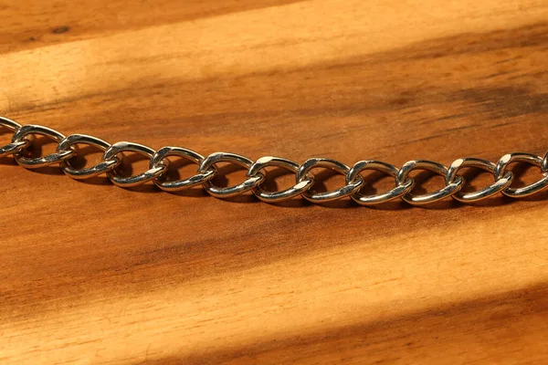Beautiful Chain Bracelet Wooden Background — Stock Photo, Image