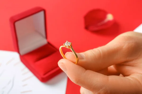 Man Engagement Ring Red Background Closeup — Stock Photo, Image