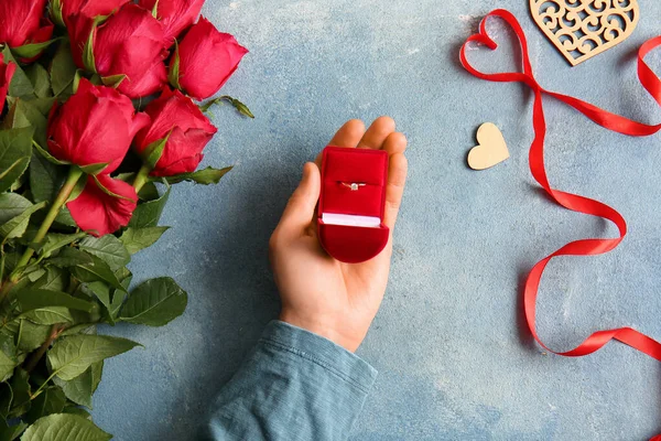 Man Engagement Ring Roses Hearts Ribbon Blue Background — Stock Photo, Image