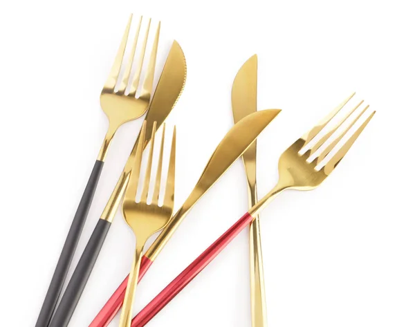 Beyaz Arka Planda Renkli Saplı Altın Bıçaklar Çatallar — Stok fotoğraf