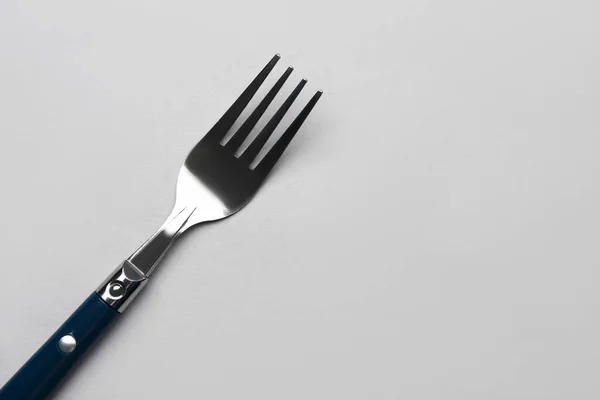Stainless Steel Fork Plastic Handle Grey Background — Stock Photo, Image