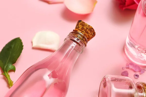 Bottles Cosmetic Oil Rose Extract Pink Background Closeup — Stock Photo, Image