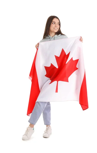 stock image Young woman with flag of Canada on white background