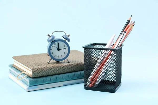 Stationery Holder Notebooks Alarm Blue Background — Stock Photo, Image