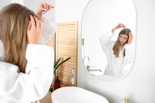 Young Woman Using Serum Hair Growth Mirror Bathroom — Stock Photo, Image