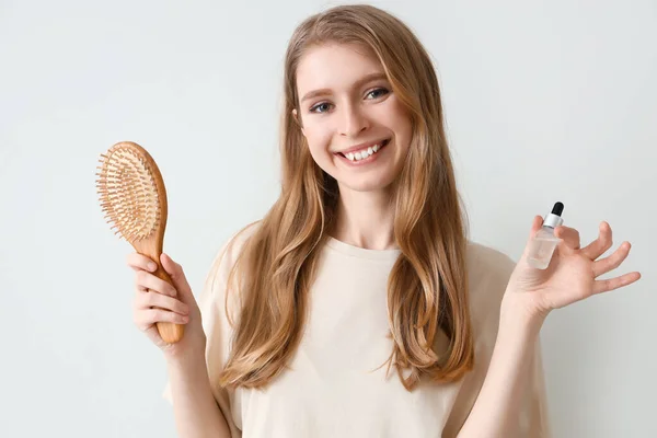 Young Woman Serum Hair Growth Brush Light Background — Stock Photo, Image