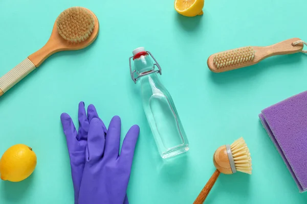 Bottle Vinegar Rubber Gloves Brushes Sponge Lemons Color Background — Stock Photo, Image
