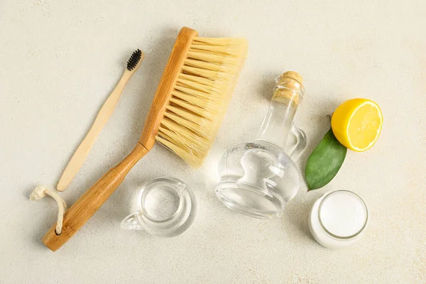 Jugs Vinegar Baking Soda Brushes Lemon Light Background — Stock Photo, Image
