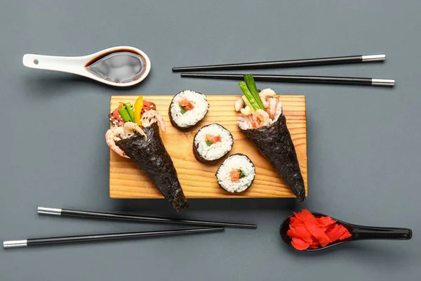 Wooden Board Tasty Sushi Cones Rolls Soy Sauce Ginger Chopsticks — Stock Photo, Image