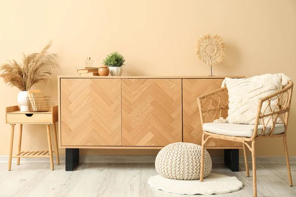 Stylish Wooden Cabinet Comfortable Armchair Beige Wall — Stock Photo, Image