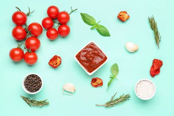 Bowl Delicious Tomato Sauce Ingredients Turquoise Background — Stock Photo, Image