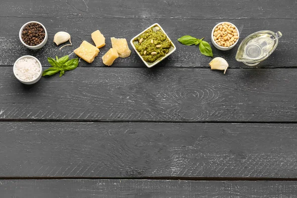Composition Bowl Pesto Sauce Ingredients Black Wooden Table — Stock Photo, Image
