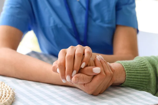 Young Caregiver Senior Woman Holding Hands Kitchen Closeup — Stock Photo, Image