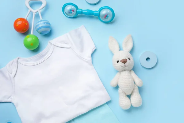 Composition Baby Clothes Toys Blue Background — Stock Photo, Image