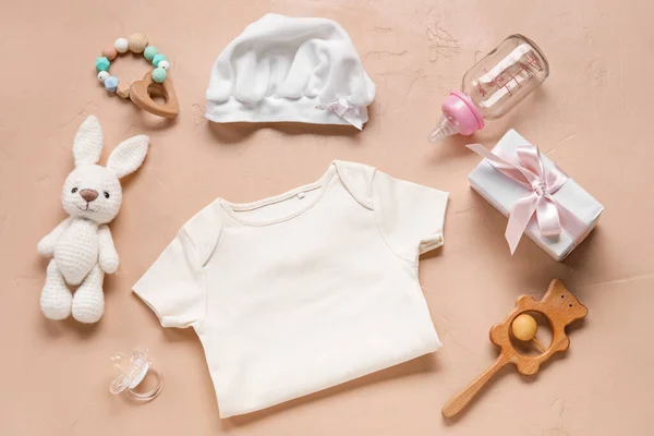 Composition Baby Clothes Toys Accessories Beige Background — Stock Photo, Image