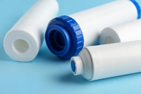 New Water Filter Cartridges Blue Background Closeup — Stock Photo, Image