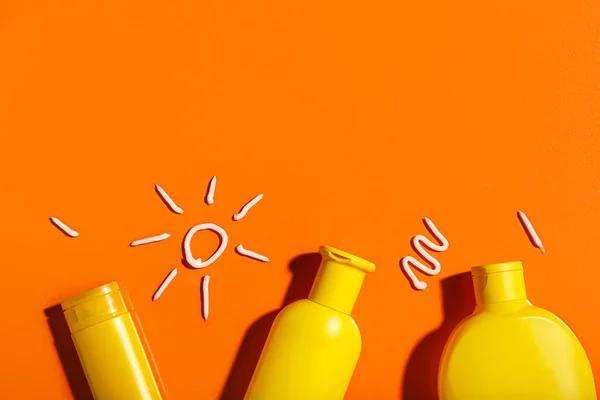 Drawings Sun Made Sunscreen Creams Orange Background — Stock Photo, Image