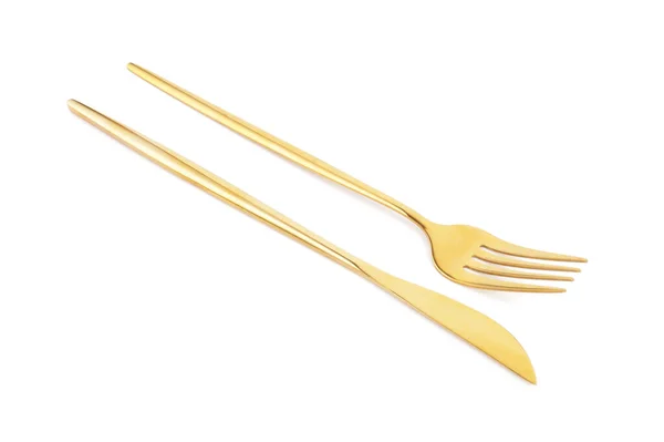 白い背景にナイフで黄金のフォーク — ストック写真