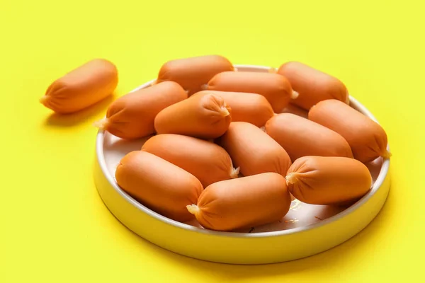 Plate Tasty Boiled Sausages Yellow Background — Stock Photo, Image
