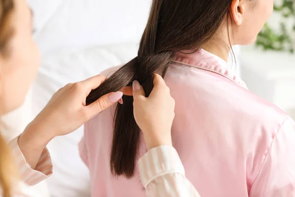 Young Woman Doing Hair Her Friend Bedroom Closeup — Stock Photo, Image
