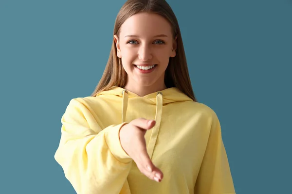 Teenage Girl Reaching Out Handshake Blue Background Closeup — Stock Photo, Image