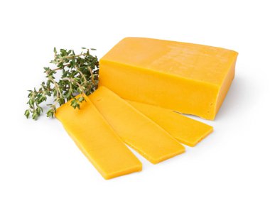 Pieces of tasty cheddar cheese and thyme on white background clipart
