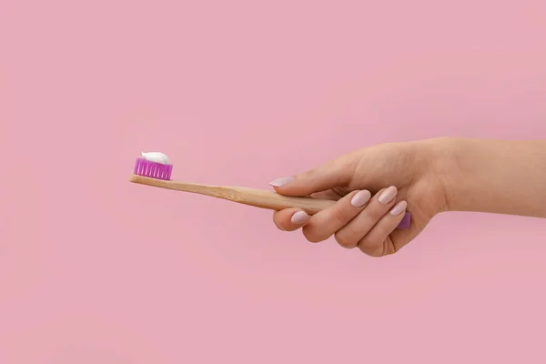 Female Hand Toothbrush Paste Pink Background — Stock Photo, Image