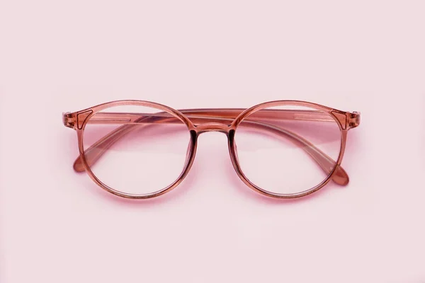 Soluk Pembe Arkaplanda Şık Gözlükler — Stok fotoğraf