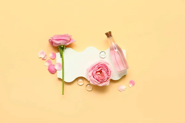 Bottle Cosmetic Oil Rose Extract Flowers Yellow Background — Stock Photo, Image