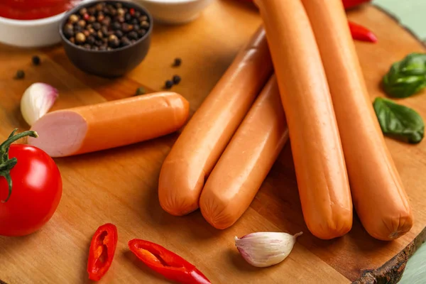 Board Tasty Sausages Basil Chilli Closeup — Stock Photo, Image
