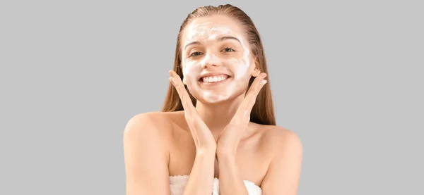 Beautiful Young Woman Soap Foam Face Grey Background — Stock Photo, Image