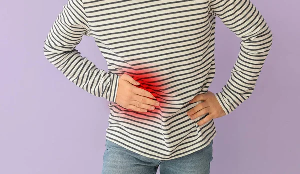 Young Man Suffering Appendicitis Lilac Background — Stock Photo, Image