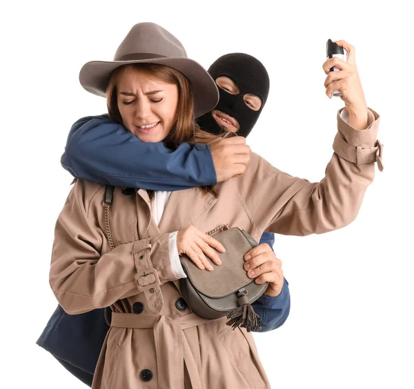 Young Woman Pepper Spray Defending Herself Thief White Background — Stockfoto
