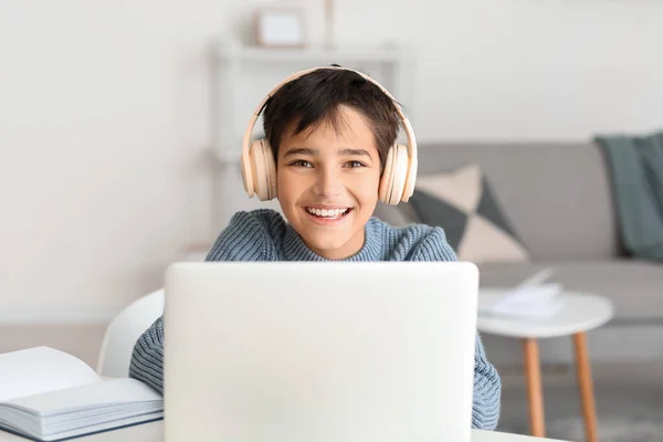 Happy Little Boy Headphones Using Laptop Home — Stock fotografie