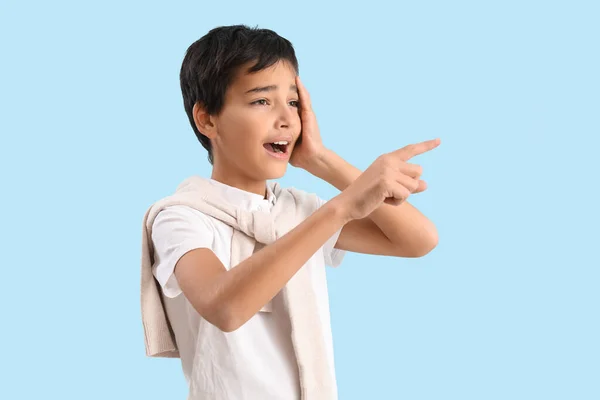Shocked Little Boy Using Virtual Screen Blue Background — Stock Photo, Image