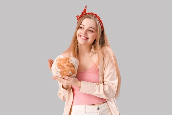 Young Woman Fresh Bread Grey Background — Zdjęcie stockowe