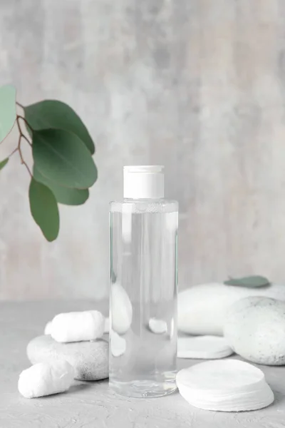 Bottle Micellar Water Cotton Pads Balls Spa Stones Grey Table — Stock Photo, Image