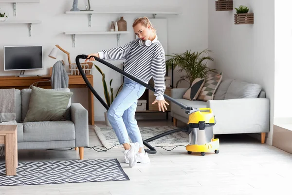 Young Woman Dancing While Hoovering Home — Stock Photo, Image